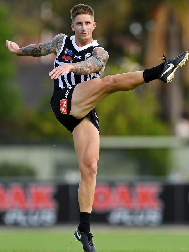 Hartlett at full stretch during his return to competitive footy in an SANFL trial game in March. Picture: Tom Huntley