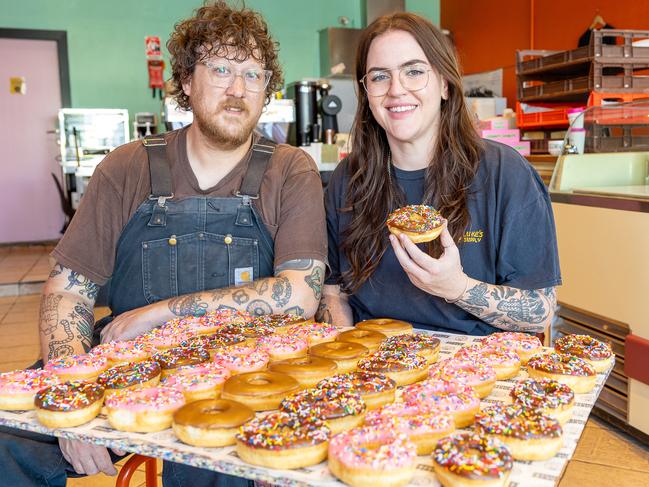 Sydney couple Scott and Elise Clarke say they are fighting uphill to keep their bakery, Grumpy Donuts, and cafe, Valentina’s, afloat. Picture: Thomas Lisson