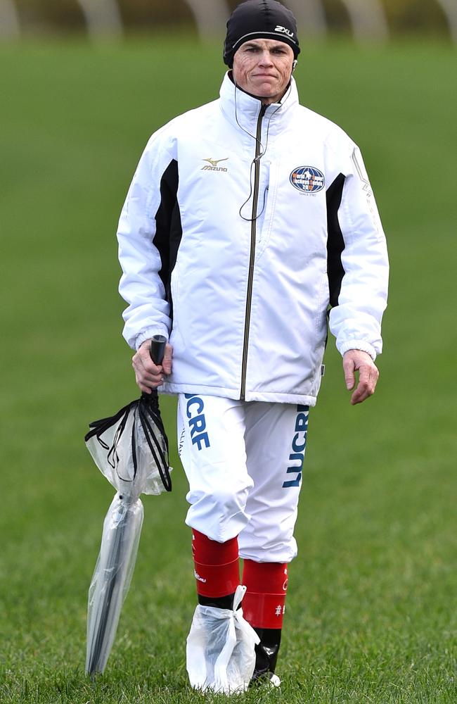 Business as usual: Craig Williams walks the track at Flemington on Saturday. Picture: Getty Images