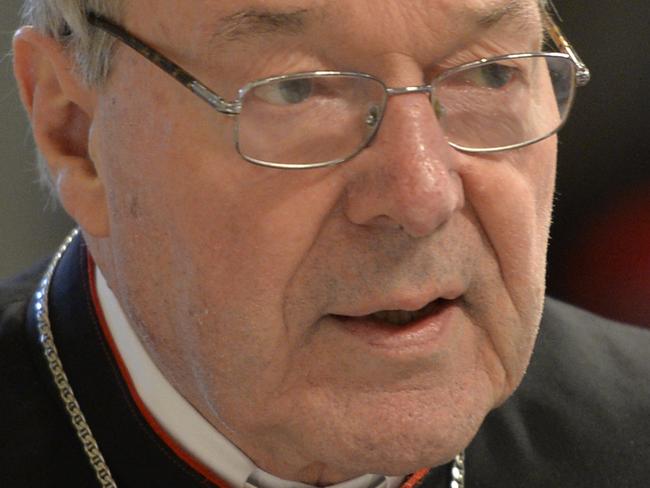 Australian Cardinal George Pell, Prefect of the Secretariat for the Economy of the Holy See arrives to attend a Chrism mass for Holy Thursday (Maundy Thursday) which marks the start of Easter celebrations on April 2, 2015 at St Peter's basilica in Vatican. AFP PHOTO / ANDREAS SOLARO