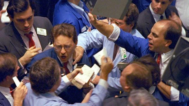 **FILE** Traders on the floor of the New York Stock Exchange work frantically as panic selling swept Wall Street in this Oct. 19, 1987 file photo. In the 20 years since one of Wall Street's worst crashes, the markets have grown bigger, more complex and faster. Investors have become increasingly aggressive, whether buying or selling. So while Wall Street was devastated by a 508-point plunge in the Dow Jones industrials on Oct. 19, 1987, a drop of that size today, while much smaller on a percentage basis, remains frightening. (AP Photo/Peter Morgan, File) Picture: Ap