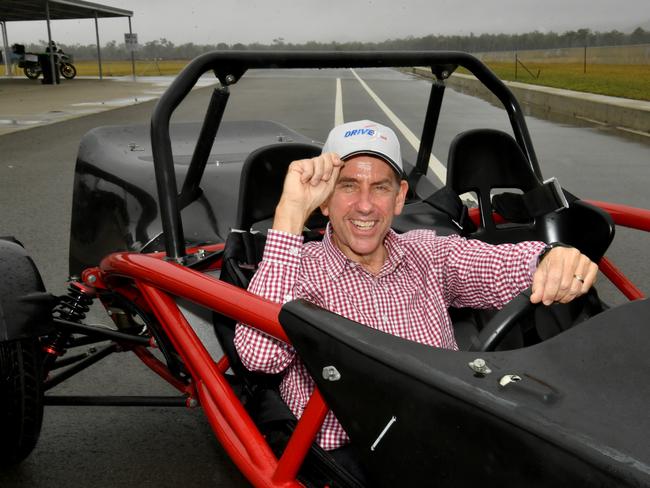 Deputy Premier and Treasurer Cameron Dick at the DriveIt Calcium facilty with a Ariel Tiger Shark GT. Picture: Evan Morgan