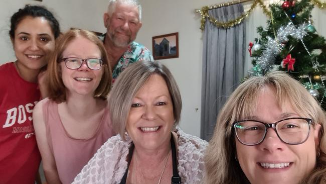 Registered nurse Deepa Koirala (far left) who lived with aged care director Jenny Deer (centre) after she moved to Australia to work, lived in Ms Deer’s home for eight months. Pictured with the family on Christmas Day 2023.