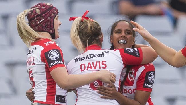 Shakiah Tungai celebrates a try with her Dragons teammates. Picture: AAP