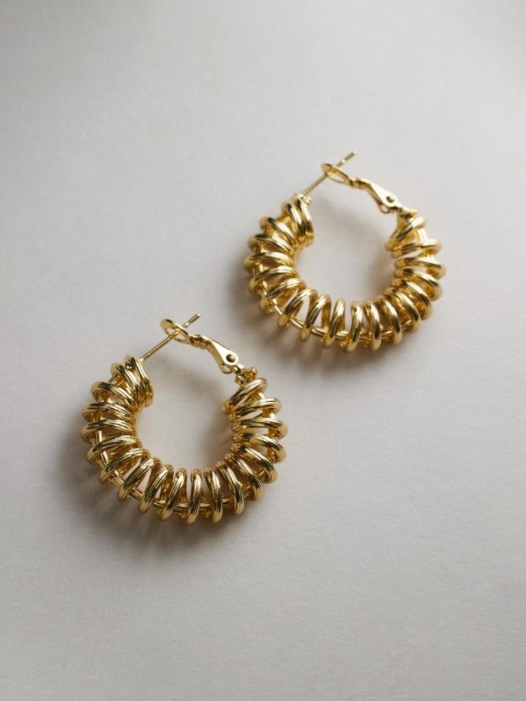 Reliquia Jewellery Spiral Hoop Earrings. Picture: THE ICONIC.