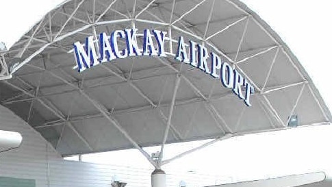 Mackay airport security stopped a man who had been concealing a handgun and $110,000 cash in his luggage.