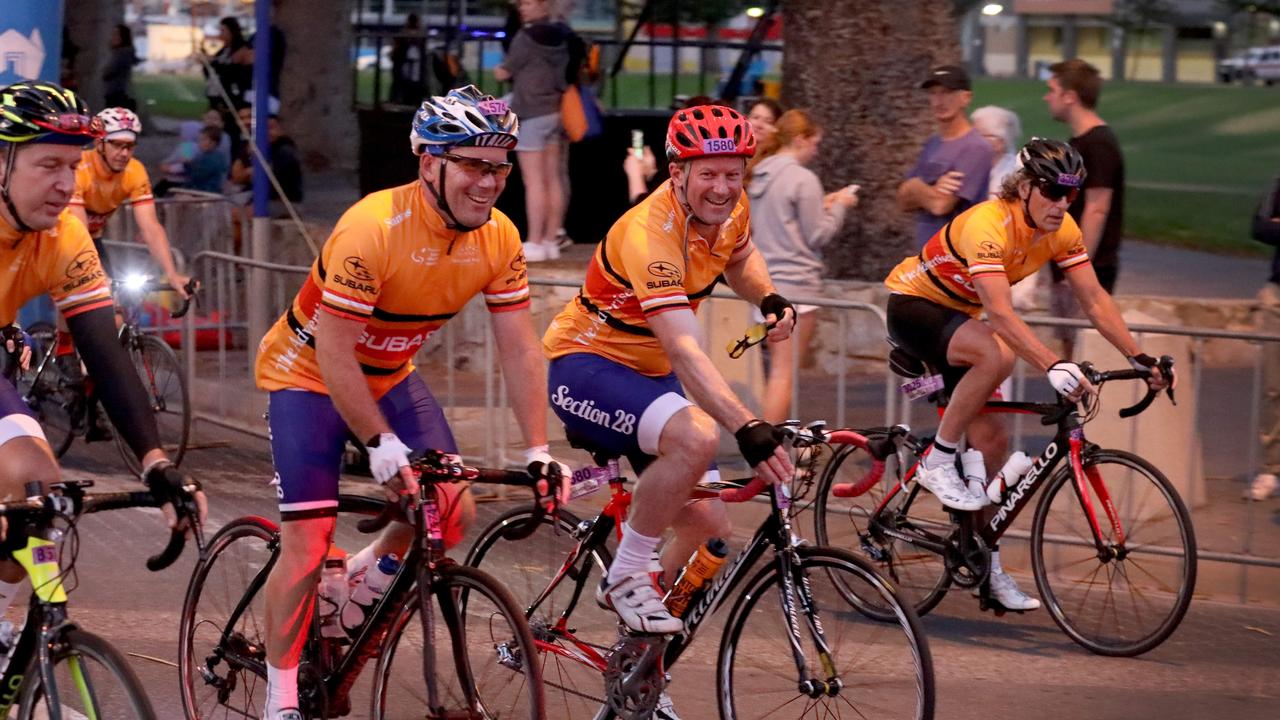 Riders at the start of the event at 6am, among which, Liberal member for Heysen, Josh Teague (red helmet no.1580) (AAP Image/Dean Martin)