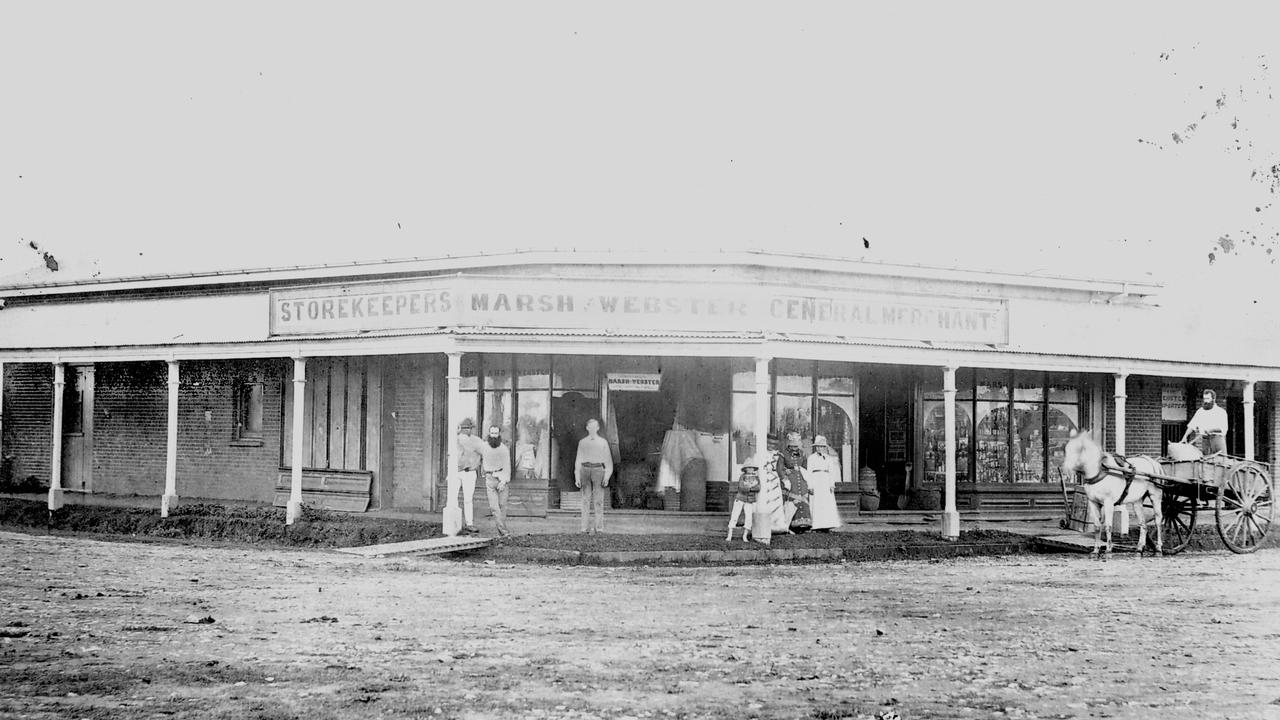 A group of early Mackay residents stand on the footpath outside department store Marsh and Webster c. 1880. Picture: Mackay Regional Council Libraries.