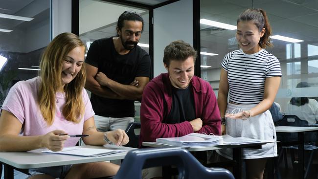 International students Radka Sustkova of the Czech Republic, Mohammed Al Yousef of Saudi Arabia, Michael Di Venti of Italy and Kotori Sugahara from Japan commenced their studies in at the Cairns College of English and Business last year. Picture: Brendan Radke