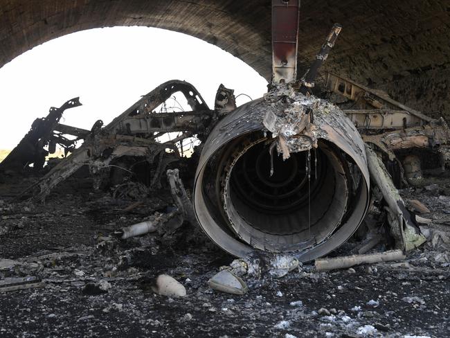 The wreckage of plane following the US missile attack on an air base in Syria. Picture: Mikhail Voskresenskiy/Sputnik/AFP.