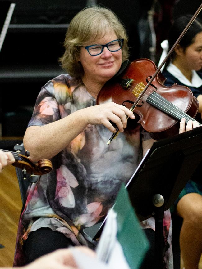 Christine Buwalda now teaches strings as part of her music program.