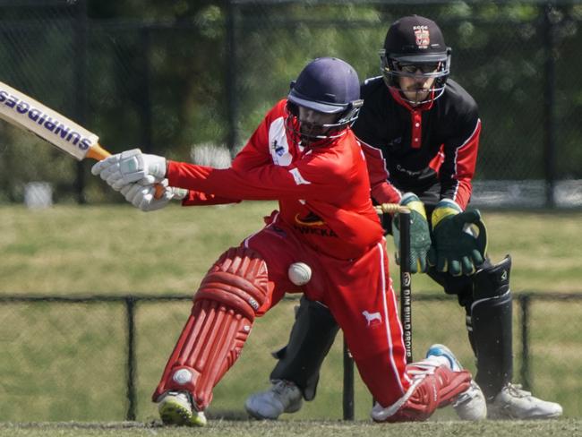 Cricket Southern Bayside: Championship Div: Mordialloc v South Caulfield. Mordialloc batter A K V Tyrone and South Caulfield  keeper Elliott Bradley. Picture: Valeriu Campan