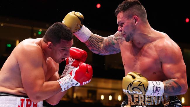 RIYADH, SAUDI ARABIA - MARCH 08: Kevin Lerena punches Justis Huni during the WBO Global Heavyweight Title fight between Justis Huni and Kevin Lerena on the Knockout Chaos boxing card at the Kingdom Arena on March 08, 2024 in Riyadh, Saudi Arabia. (Photo by Richard Pelham/Getty Images)