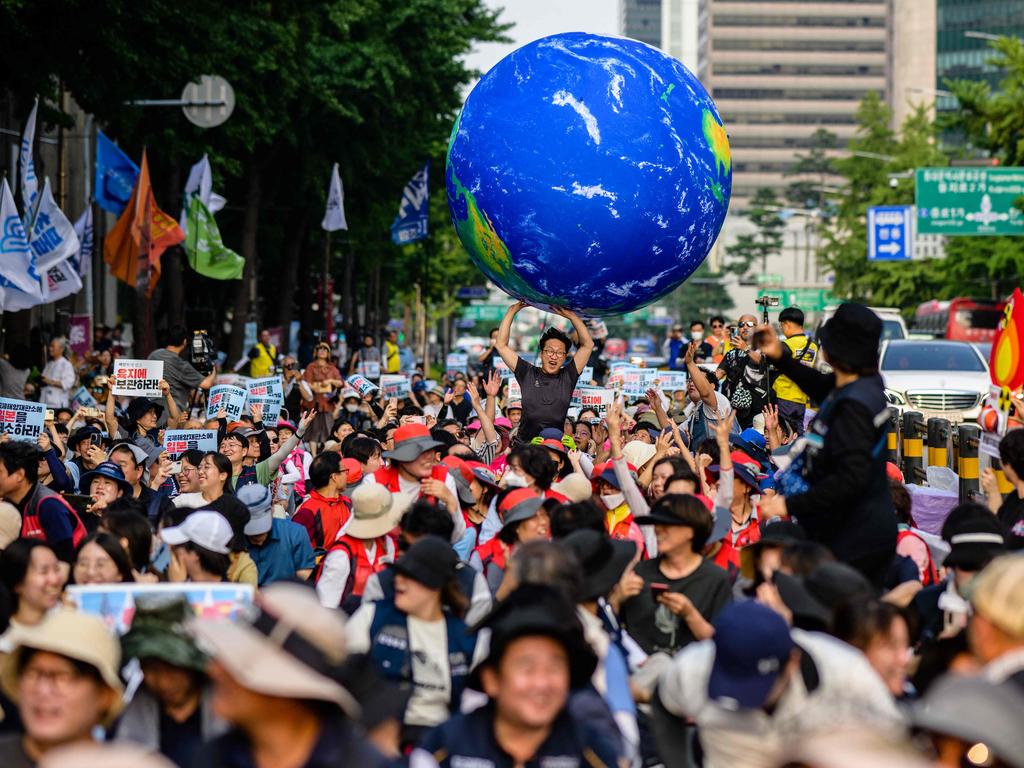 Activists gather to protest against a planned release of water from the Fukushima Dai-Ichi nuclear plant in Japan, in Seoul on June 24.