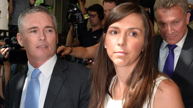 MP Craig Thomson and his wife Zoe leave the Magistrates Court in Melbourne in 2013.