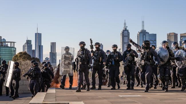 Police move in on protesters at Melbourne’s Shrine of Remembrance on Wednesday. Picture: Jason Edwards