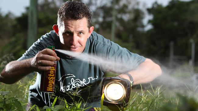 Cairns resident David Lang tries the new Cane toad killer HopStop. Picture: Tom Lee