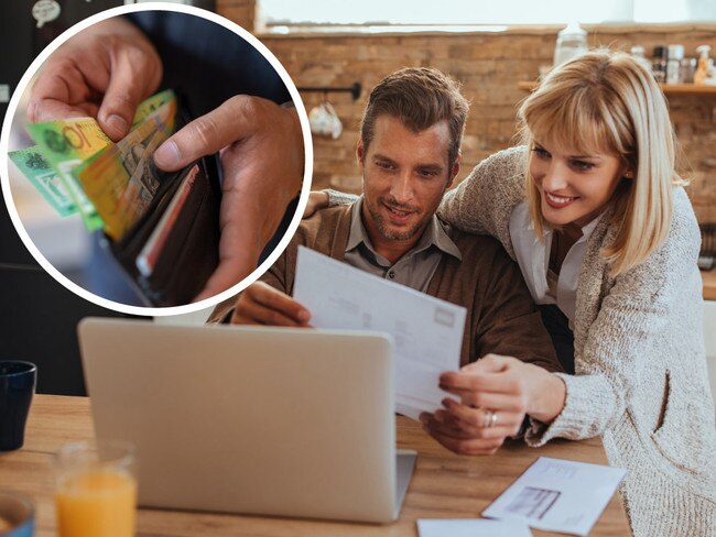 Artwork of cash and couple looking at bills.