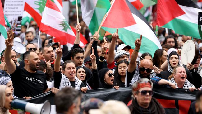 Protesters march through Sydney's CBD to call for peace and an end to the current Israeli occupation of Palestine. Picture: NewsWire / Damian Shaw