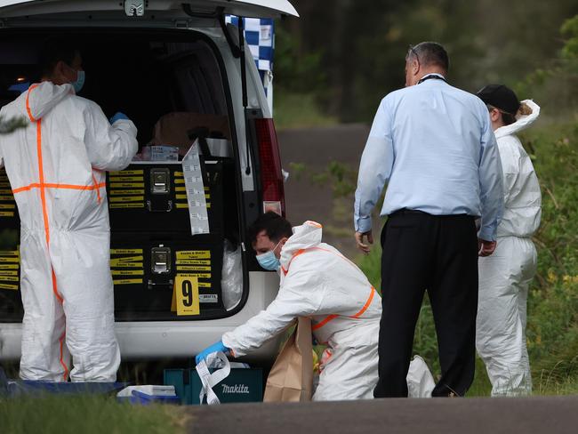 Crime scene specialists at the scene where Mr Chen’s body was found. Picture: Dylan Coker