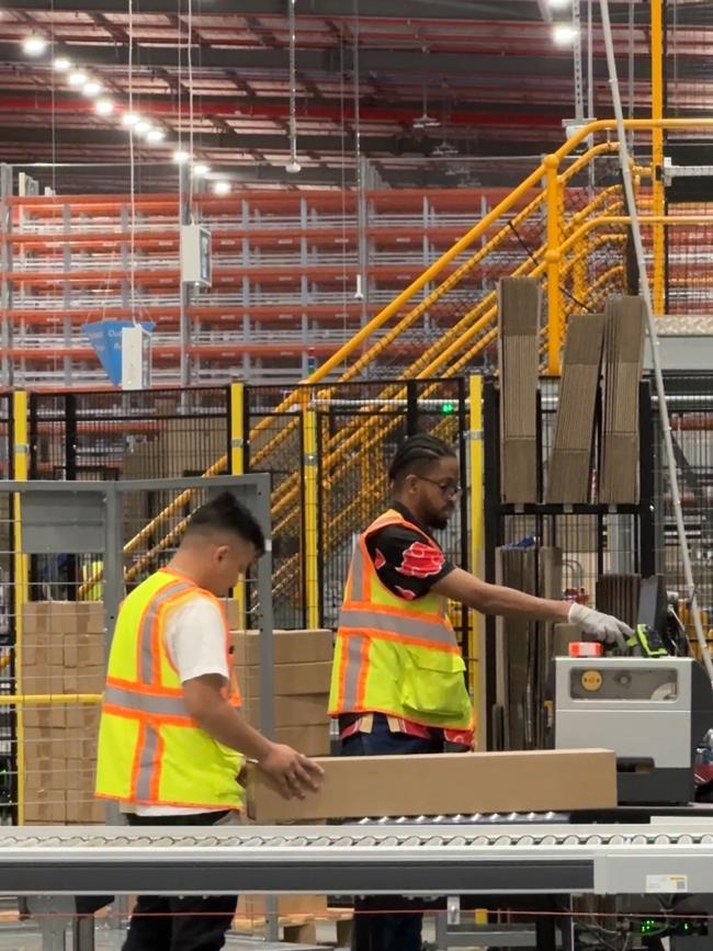 Workers at the new Amazon BWU6 fulfilment centre at Horsley Park. Picture: Canterbury Bankstown Express