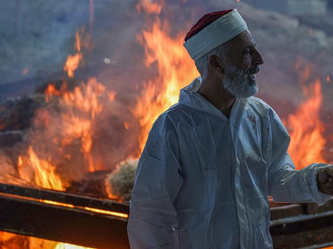 Samaritans take part in the traditional Passover sacrifice ritual in the occupied West Bank. The Samaritans trace their lineage to the biblical ancient Israelites. Picture: AFP