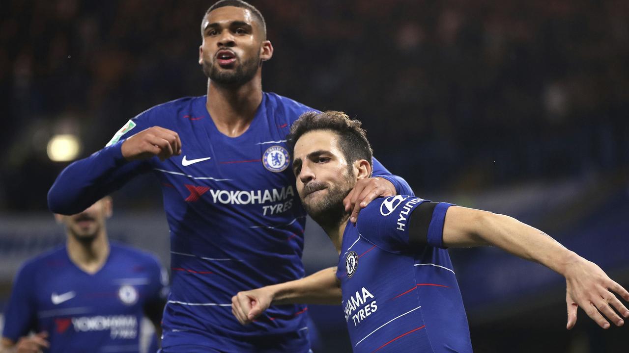 Chelsea's Cesc Fabregas (right) celebrates scoring his side's third goal