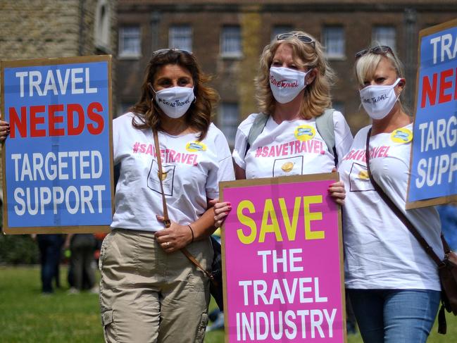 Representatives from the travel industry demonstrate during a 'Travel Day of Action' outside the Houses of Parliament in London. Picture: AFP