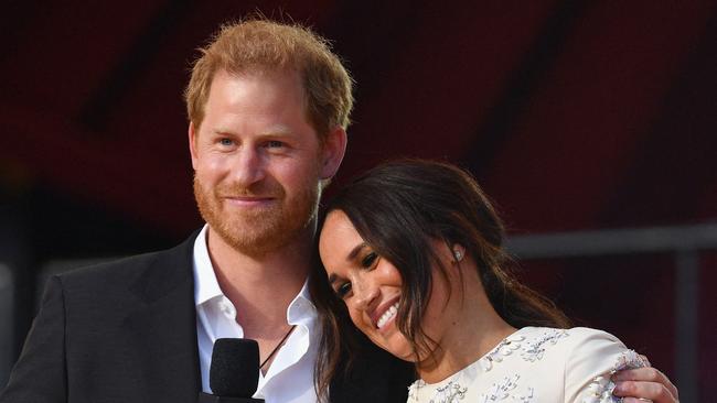 (FILES) Britain's Prince Harry and Meghan Markle speak during the 2021 Global Citizen Live festival at the Great Lawn, Central Park on September 25, 2021 in New York City. A multi-million-dollar deal between a media group run by Britain's Prince Harry and his wife Meghan Markle, and streaming giant Spotify is to end, a report said June 15, 2023. (Photo by Angela Weiss / AFP)