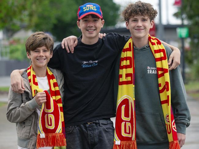 Archie and Flynn Smith with Carter Marsh before the Suns V Freo at People First Stadium Cararra. Picture: Glenn Campbell