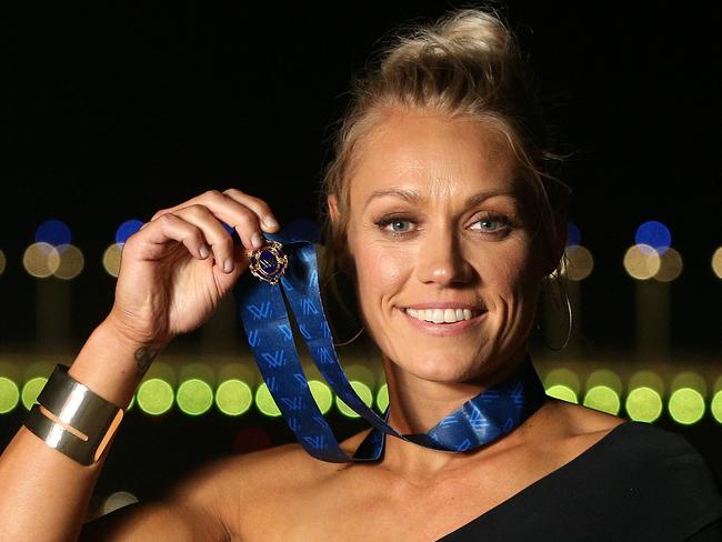 Erin Phillips of the Crows poses for a photo after winning the Best and Fairest Award during the AFLW Best and Fairest Awards ceremony in Melbourne, Tuesday, April 2, 2019. (AAP Image/Hamish Blair) NO ARCHIVING