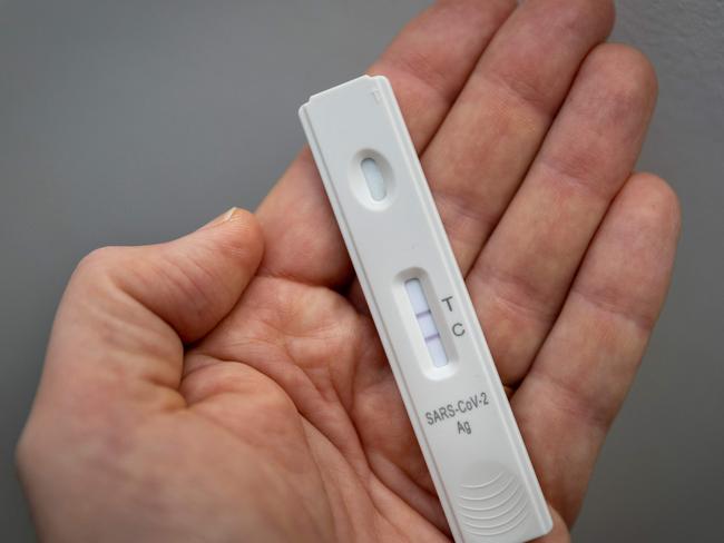 A used rapid antigen test, showing a positive result for Covid. Picture: Odd ANDERSEN / AFP