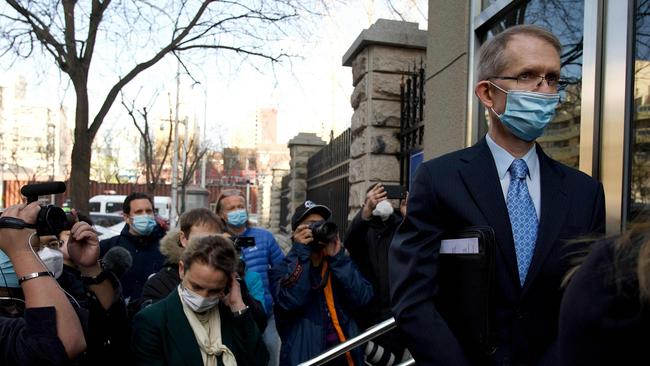 Australian Ambassador to China Graham Fletcher waits outside the Beijing No. 2 People's Intermediate Court, before being denied entry. Picture: AFP.