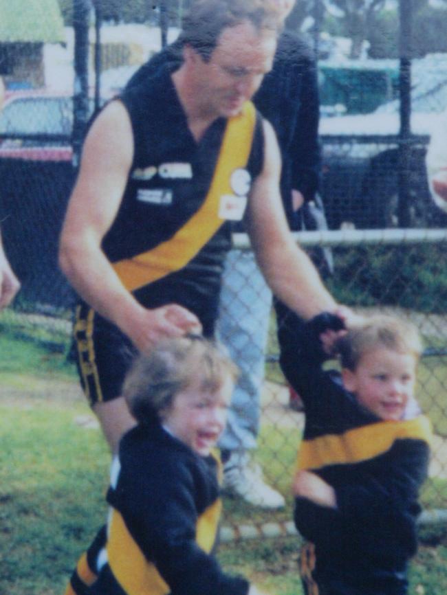 Travis Boak with his father Roger and sister Sarah.