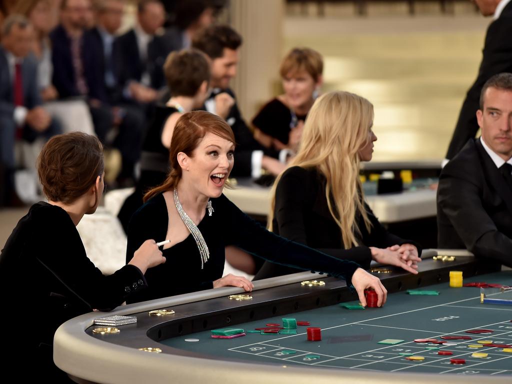 Kristen Stewart, Julianne Moore and Lara Stone attend the Chanel show. Picture: Getty