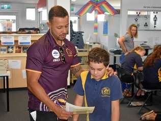 MAN TO MAN: Scott Prince sharing some off-field wisdom with Roma State College students in the Beyond the Broncos program. Picture: James Liveris