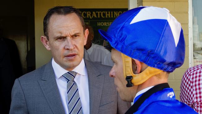 Great Glen (blue) ridden by Kerrin McEvoy and trained by Chris Waller (pictured) wins race 1 at Hawkesbury Racetrack. Pic Jenny Evans