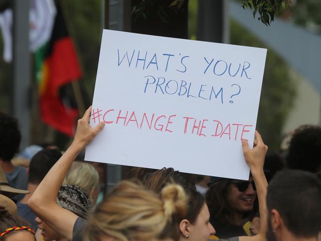 Protesters held signs and banners demanding Australia listen to their cries. Picture: John Grainger