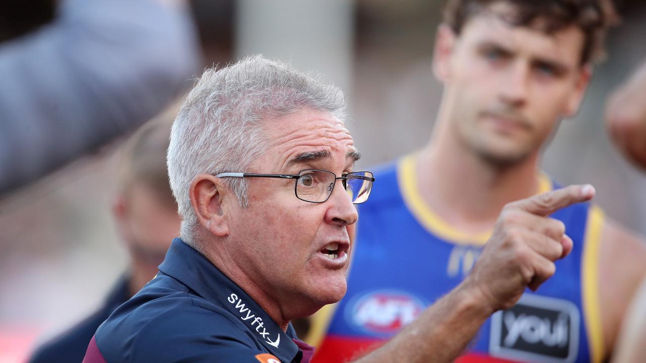ADELAIDE, AUSTRALIA – MARCH 18: Chris Fagan, Senior Coach of the Lions with his players at 3 quarter time during the 2023 AFL Round 01 match between the Port Adelaide Power and the Brisbane Lions at Adelaide Oval on March 18, 2023 in Adelaide, Australia. (Photo by Sarah Reed/AFL Photos via Getty Images)
