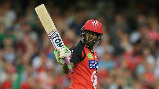 Dwayne Bravo celebrates bringing up a half-century for the Renegades.