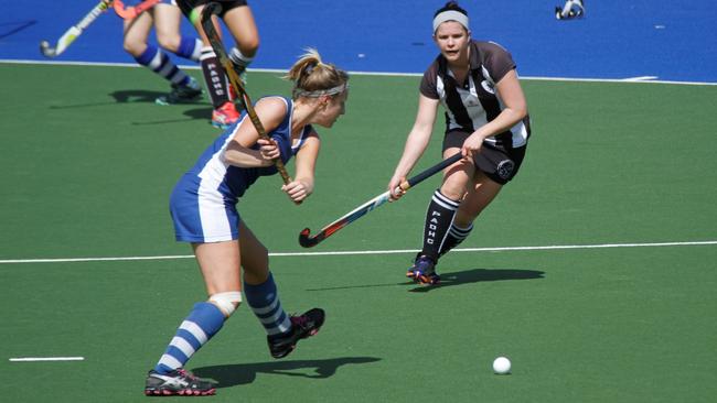 Port Adelaide Metro One player Ilona Flockhart in action against St Peter's Old Collegians during the 2015 grand final. Picture: Port Adelaide Hockey Club