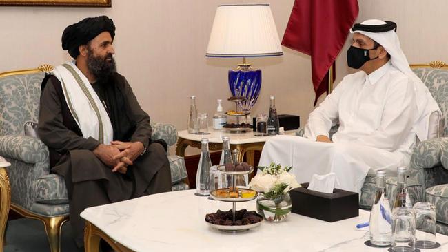 Qatar's Deputy Prime Minister and Foreign Minister Sheikh Mohammed bin Abdulrahman al-Thani, right, meeting with Taliban co-founder Mullah Abdul Ghani Baradar, left, on the sidelines of the opening ceremony of the Afghan negotiations. Picture: AFP PHOTO / QNA / HO