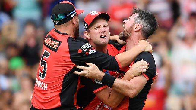 Aaron Finch, Cameron White and Dan Christian celebrate after the final ball. Picture: Getty Images 