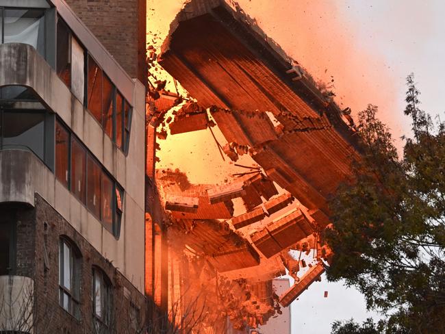 The street facing wall collapses onto Randle St, Surry Hills. Picture: Dean Lewins/AAP