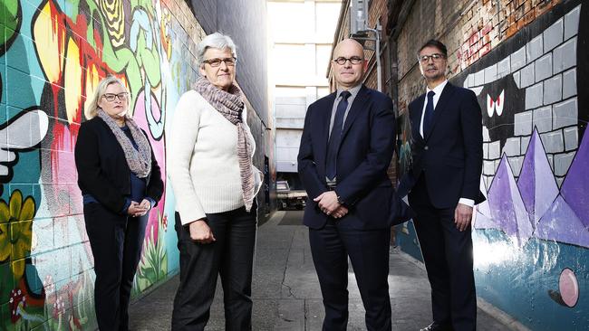 CEO of women's legal aid Yvette Cehtel, and chair Sonia Shimeld alongside chair of Legal Aid, Patrick Lunn and director Vincenzo Caltabiano. Picture: Zak Simmonds