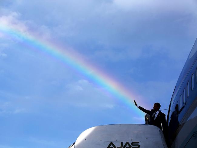 “The President’s wave aligns with a rainbow as he boards Air Force One at Norman Manley International Airport prior to departure from Kingston, Jamaica on April 9, 2015” Picture: Pete Souza/The White House