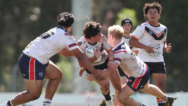 Macarthur charging into the Roosters’ defence. Picture: Sue Graham