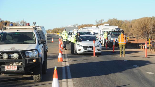 Police checking motorists from South Australia heading to Northern Territory . Picture: Michael Marschall