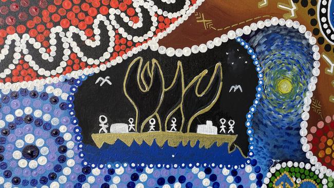 Part of a man's painting,  displaying a boat his ancestors used to travel across Northern Australia and into Asia on trading routes. Above is a section of Chris Gray's art which contains a ring of people (the 'U' shapes), representing Mates4Mates as a meeting place for everyone.