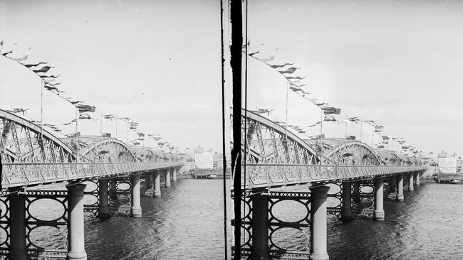 New Light: Photography Now + Then exhibition at Museum of Brisbane - Alfred Elliott, Victoria Bridge decorated for Duke of York visit 1901, print from glass plate negative Picture Supplied